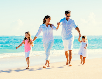 family walking on beach